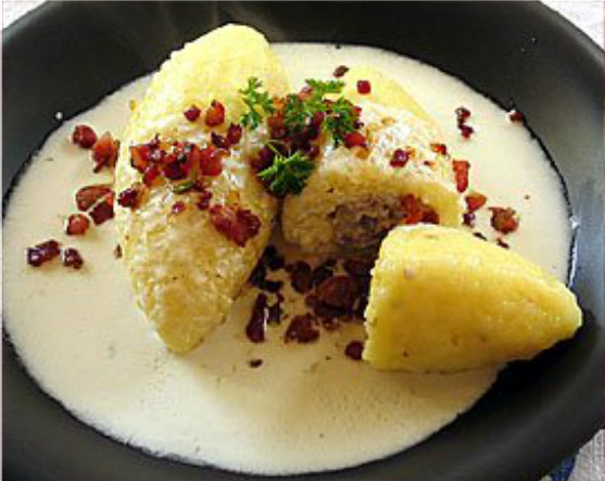Cepelinai Stuffed Potato Dumplings With Creamy Horseradish Sauce